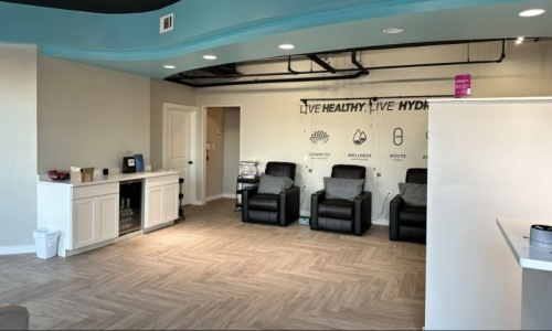 a room with black chairs